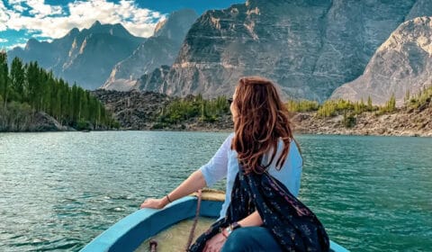 Foreigner woman boating in Upper Kachura lake, Skardu - Gilgit Baltistan, Pakistan